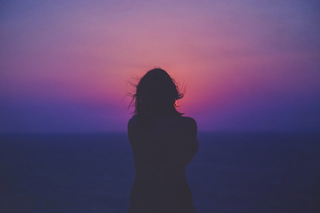 silhouette of a woman with sunset